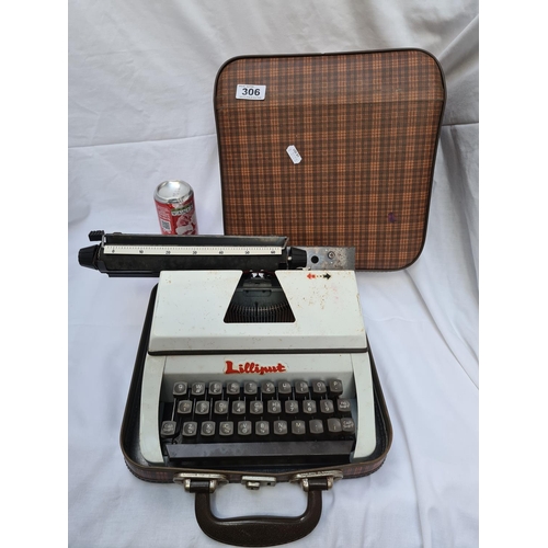 306 - Lilliput typewriter in travel case.