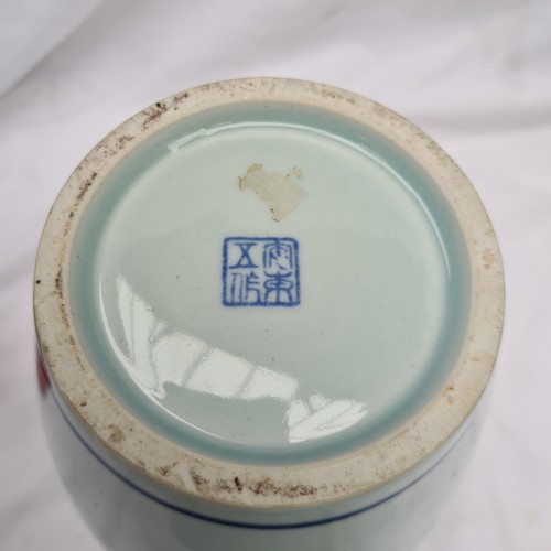 172 - Chinese tall (25cm) blue and white glazed vase in good order.