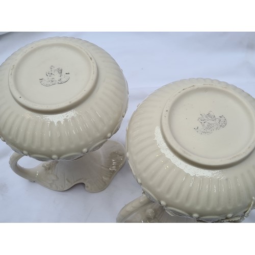 121 - Irish Belleek jugs x 2, a matching pair of 19th Century white rose jugs