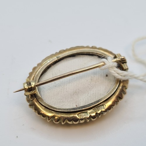 33 - Georgian 9ct gold brooch with a space in the rear for hair or a picture of your loved one.