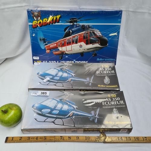 385 - Three model aircraft. All by Heller; Two National Police Helicopters and a Bobkit AS 332L Super Tige... 