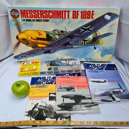 386 - 3 Japanese books on military aircraft design. A flying scale model by Keilcraft. An airfix Messersch... 