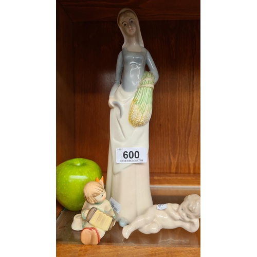 600 - One Lladro ceramic child, one country woman with barley and an angel playing the accordion, made in ... 