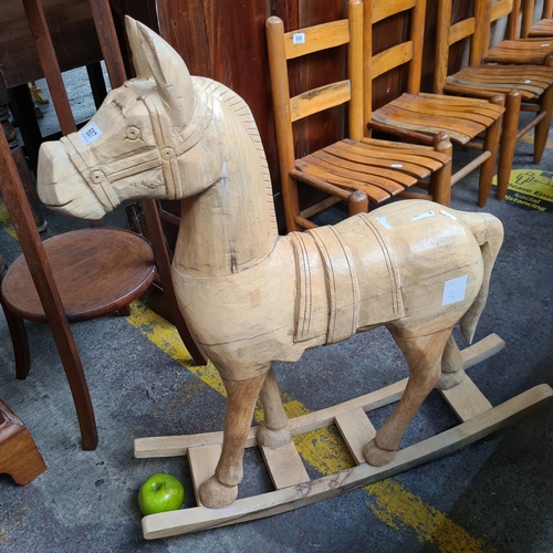 607 - Carved, solid wood child's rocking horse. 78 cm x 66 cm. Really lovely piece.