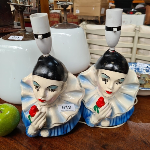 612 - Vintage pair of lamp bases, in the form of a mime, clutching a rose. Very Heavy.