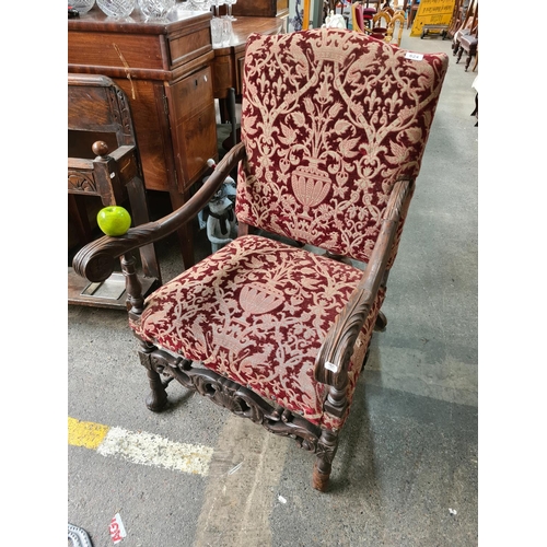 624 - Antique throne chair with red damask fabric upholstery. Lovely carving on the chair.