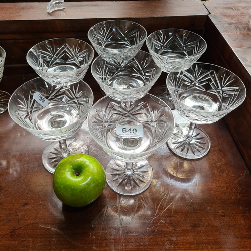 640 - Seven matching champagne saucers crystal glasses.