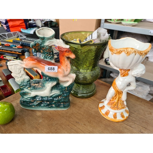 688 - Three items including a staffordshire flatback deer and cherub figure and a green vase