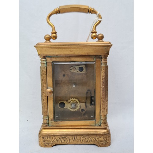 69 - Elliot & son, miniature  carriage clock. With incised floral detail and glass sides to see the mecha... 