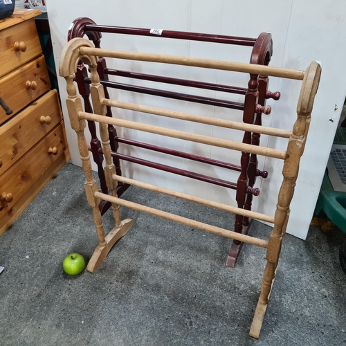 582 - Pair of wooden towel rails.