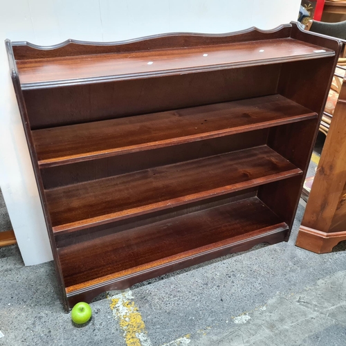 586 - Nice open bookcase with wavy top.