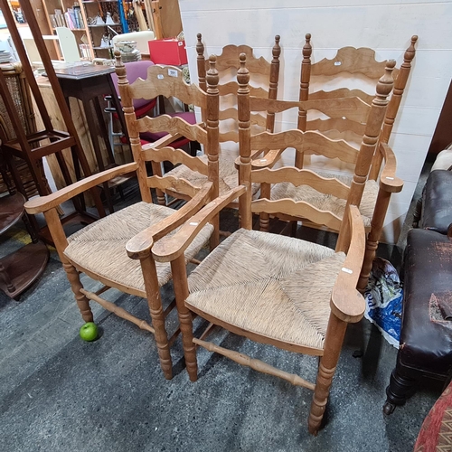 591 - Set of four tall  rattan-seat carvers with turned finials.