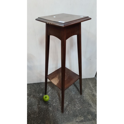 594 - Vintage two-tiered side table in a dark wood.