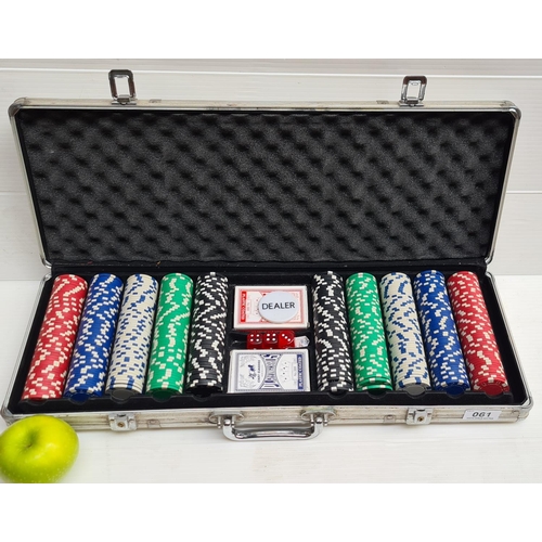 61 - Poker set in metal travelling case. Includes chips, dice, cards and dealers token.