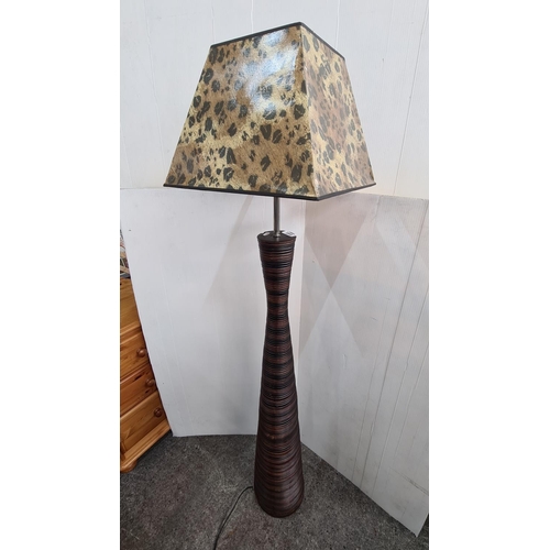 668 - Mid-century style  floor lamp with intricate turned decoration and leopard print shade. Heavy qualit... 