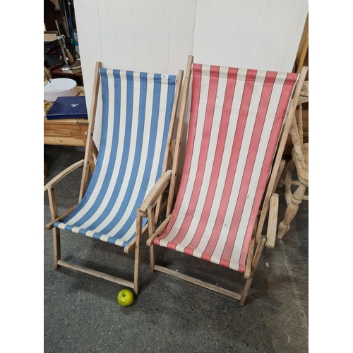 693 - Pair of beach deck-chairs. Really lovely pair in complementary blue and pink stripes.