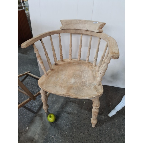 694 - Low-back captains chair in Elm. Nice rustic piece.