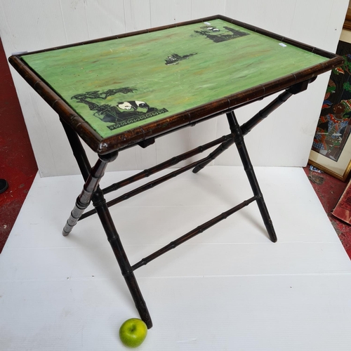 91 - Chinese drinks table with bamboo affect woodwork and painted tabletop with pandas on a green backgro... 