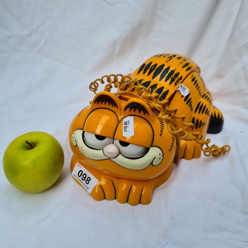 98 - Retro Garfeild telephone with tail handset and moving eyes. Really fun piece.