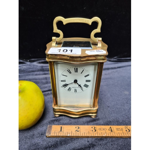 101 - Antique mechanical brass French carriage clock. 5 inches (h). In good order.