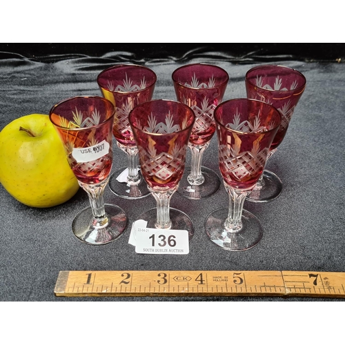 136 - Set of six cranberry stemmed port glasses