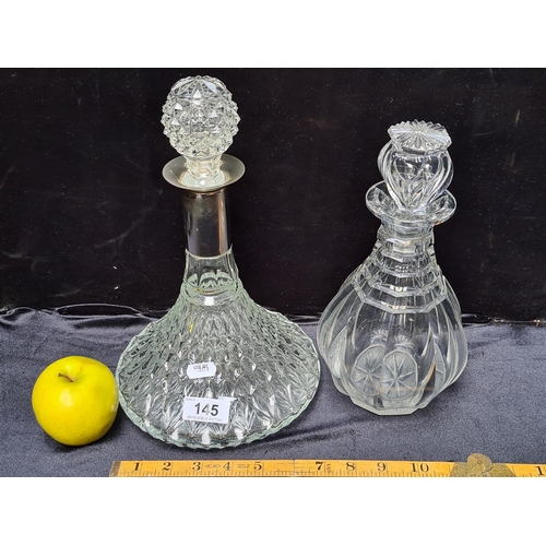 145 - Two glass decanters - one 19th century bulb decanter and a ship's decanter.