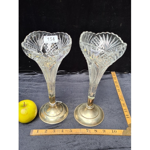 154 - Pair of antique cut glass vases with registration numbers and plated bases. Very decorative.