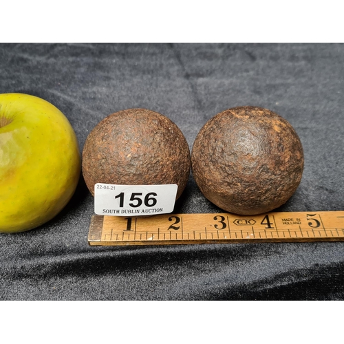 156 - Pair of antique canon balls, found in Enniscorthy. 2.5 inches in diameter.