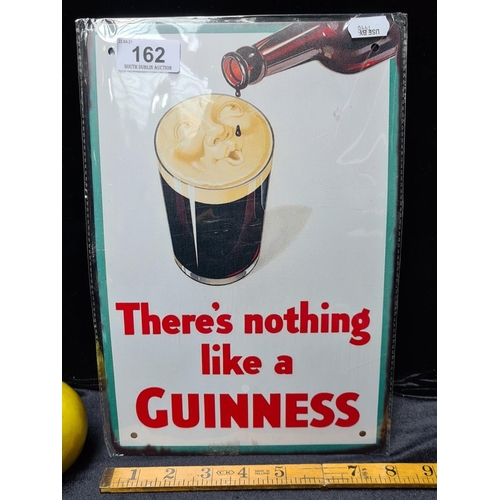 162 - Printed tin Guinness advertisement. 8 x 12 inches.