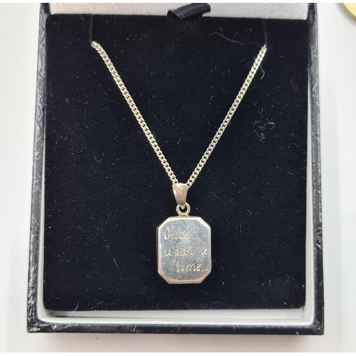 21 - New hallmarked Silver Locket and chain with tags priced at €71