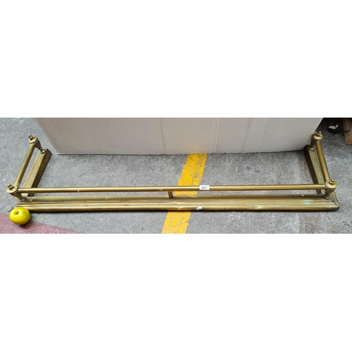 297 - Brass railed fire fender. 48