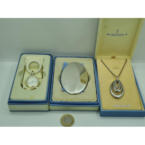 342 - Three New bridge boxed silverware items inc a pendent, keyring locket and double sided mirror