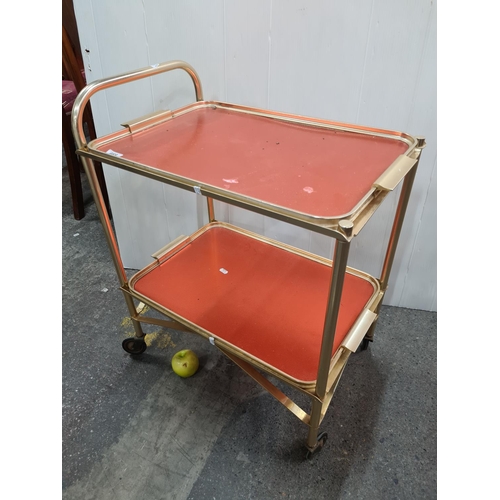 668 - Retro serving trolley with two trays and wheels.