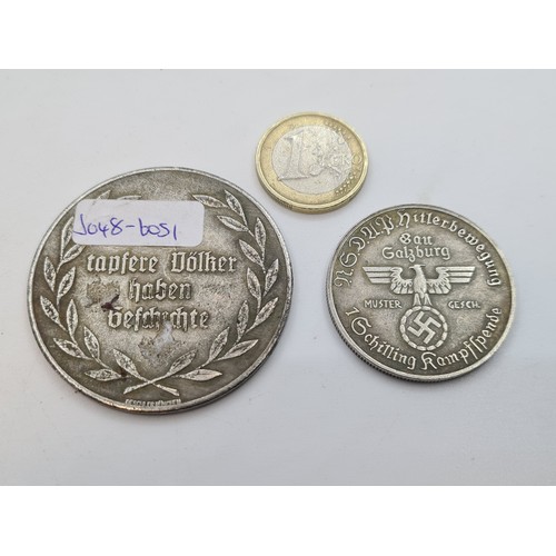 46 - Two German coins / medals one dated 1940 They don't magnetise so may have silver content