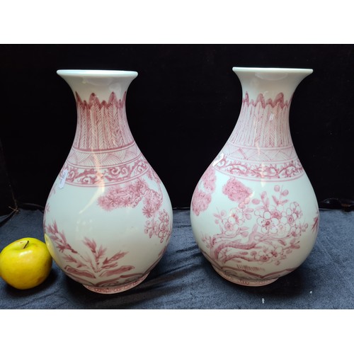 160 - Lovely pair of Chinese pink and white vases, 12 inches (h)