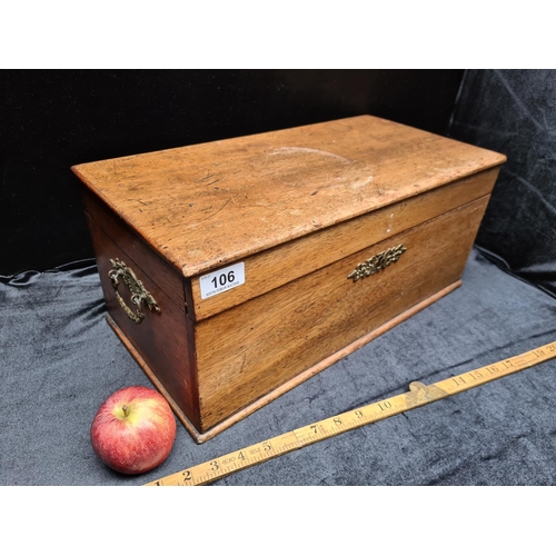 106 - Antique chest with removable tier, green felt lining and decorative brass finishings.