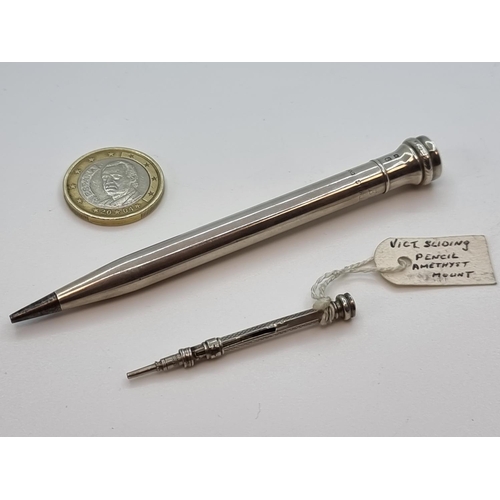 19 - Silver propelling pencil, London 1933. Weight 15g. Victorian sliding pencil with amethyst mount. Wei... 