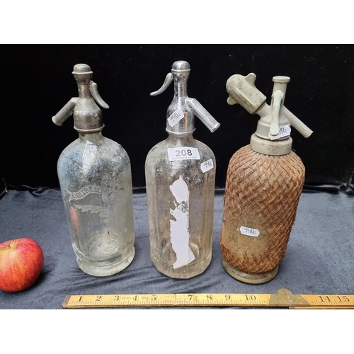 208 - Three vintage soda siphon