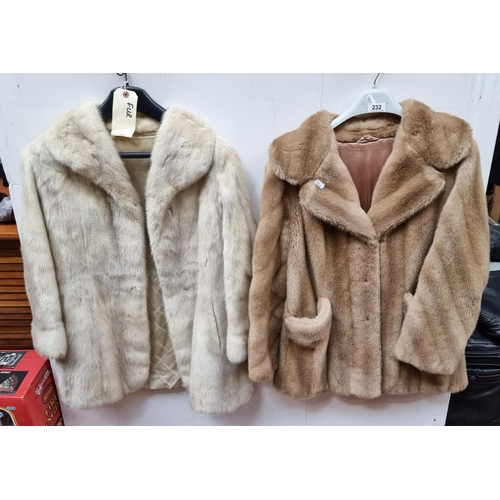 232 - Pair of fur coats, one faux tan fur and one real cream fur size M