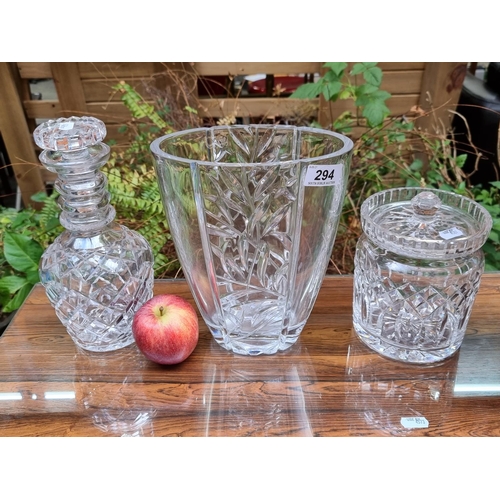 294 - Three large crystal pieces, Large vase, Waterford biscuit barrel and decanter.