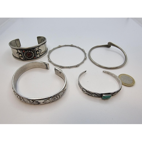 393 - A collection of 5 good silver bracelets, Inc one with a turquoise stone.