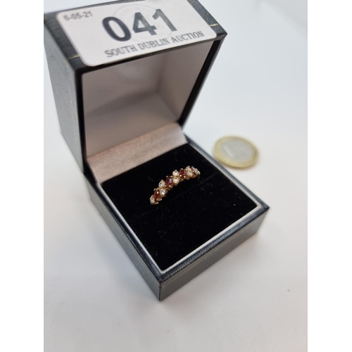 41 - 9 carat gold garnet and gemset ring, size O, weight 1.5g.