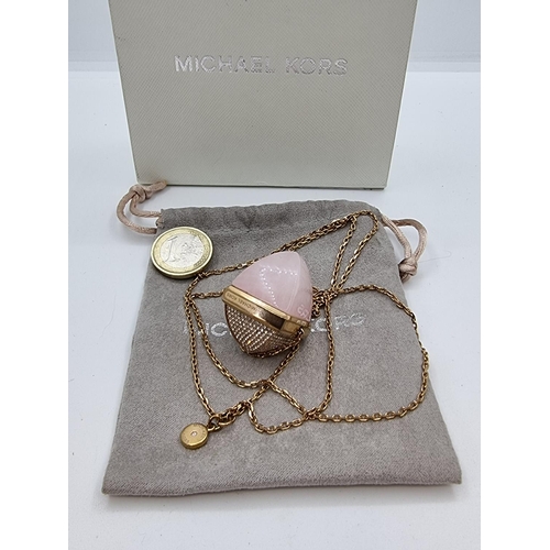 430 - Michael Kors gold chain and pendant with Large rose quartz stone.. Length of chain 70cm, in original... 