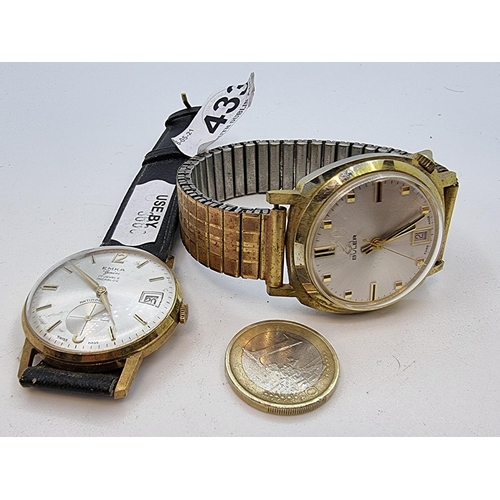 433 - Two gentleman's wristwatches, one marked Emka Geneve 17 jewel with leather strap. The other marked B... 