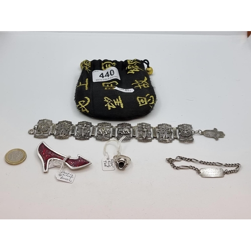 440 - Collection of items (4) including a sterling silver identity inscribed bracelet, a Moroccan silver b... 