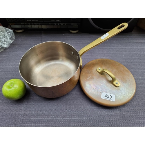 459 - A heavy antique Copper Pot with lid.