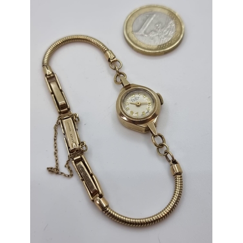 48 - 9 carat gold Bentina swiss made ladies watch with a 9ct  gold bracelet. 121 grams