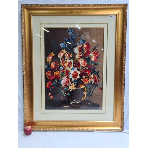 67 - Large embroidery of a still life of flowers in a vase. Very vibrant and beautifully detailed. Mm: 10... 