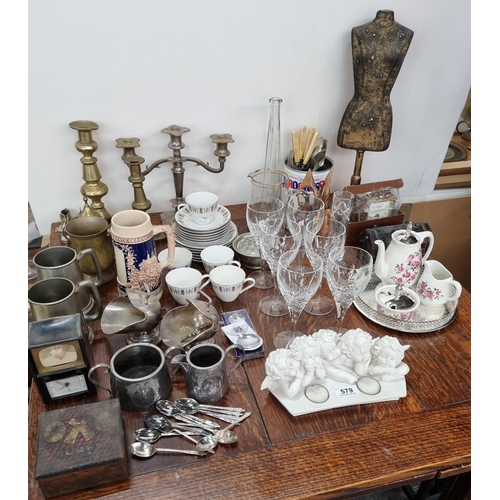 579 - Large table lot as shown in picture, beer stein, Mannequin candleabras etc.