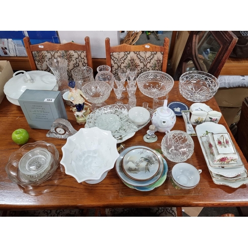 584 - Large collection of mixed items, including various crystal pieces, table lot as shown in picture